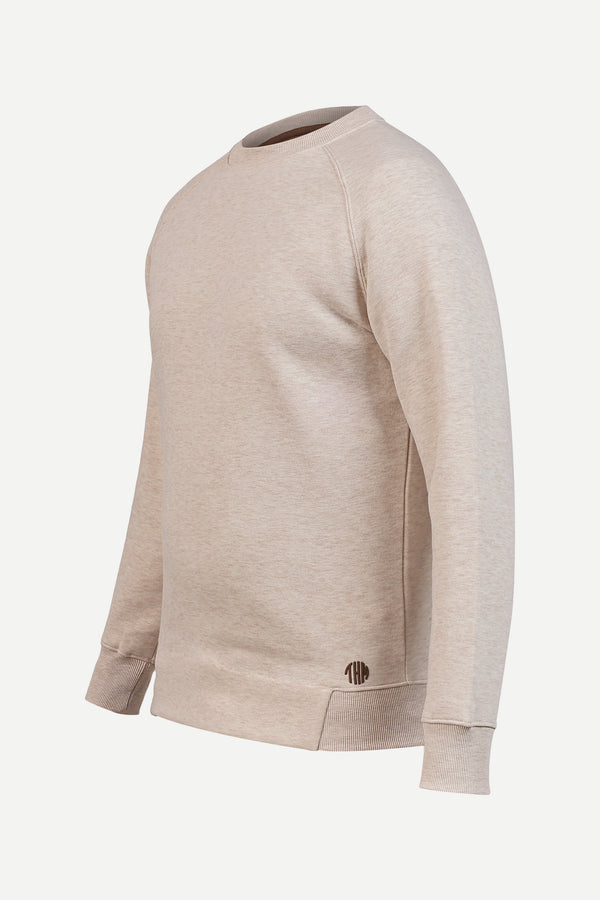 Ecru Crew Neck Sweatshirt Series IX, angled view with ribbed collar and THM logo